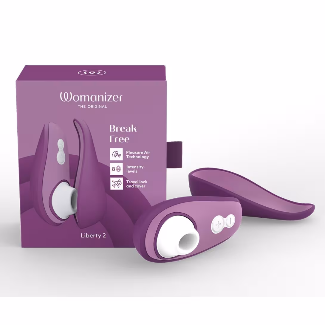 Вакуумний кліторальний стимулятор Womanizer Liberty 2 Purple, 8 режимів, магнітна кришечка — фото 9