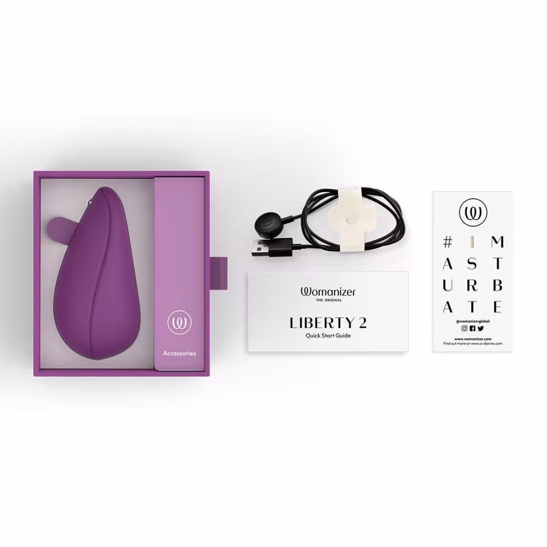 Вакуумний кліторальний стимулятор Womanizer Liberty 2 Purple, 8 режимів, магнітна кришечка — фото 7